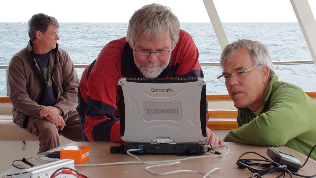 Paul Hundley and Nigel Erskine reviewing survey data