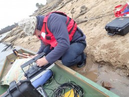 Maritime archaeologist, Brad Duncan, rigging up the sidescan sonar on the survey canoe. Copyright: Irini Malliaros/Silentworld Foundation