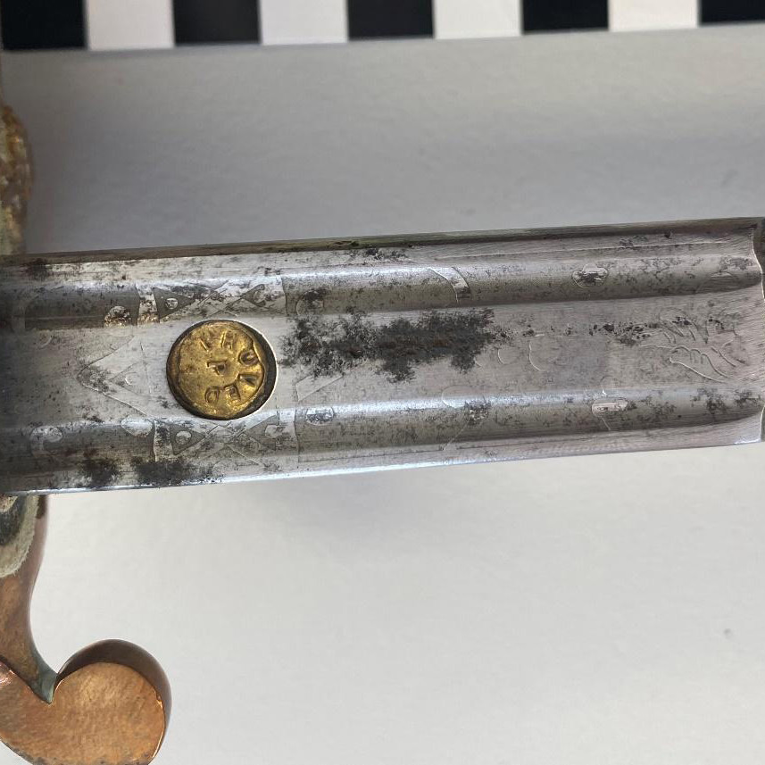 Figure 3: Before, Sword blade. Detail: Corrosion product on blade. Image: Heather Berry/Silentworld Foundation.