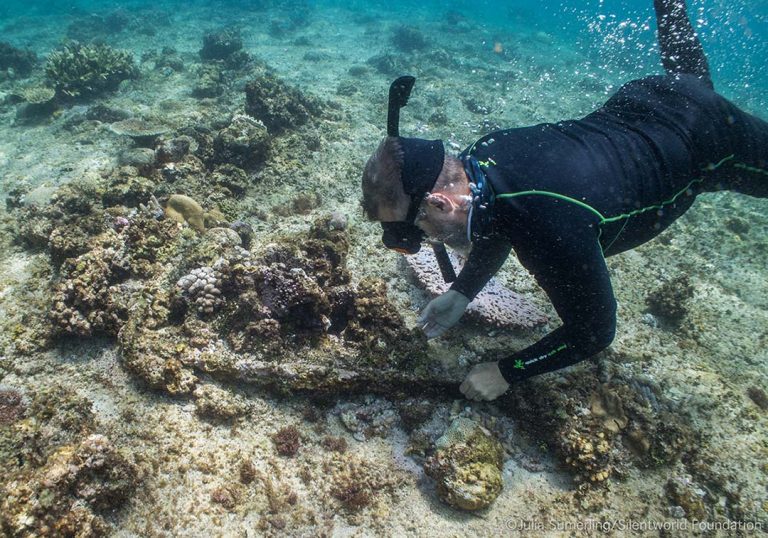 James Hunter examining iron concretions
