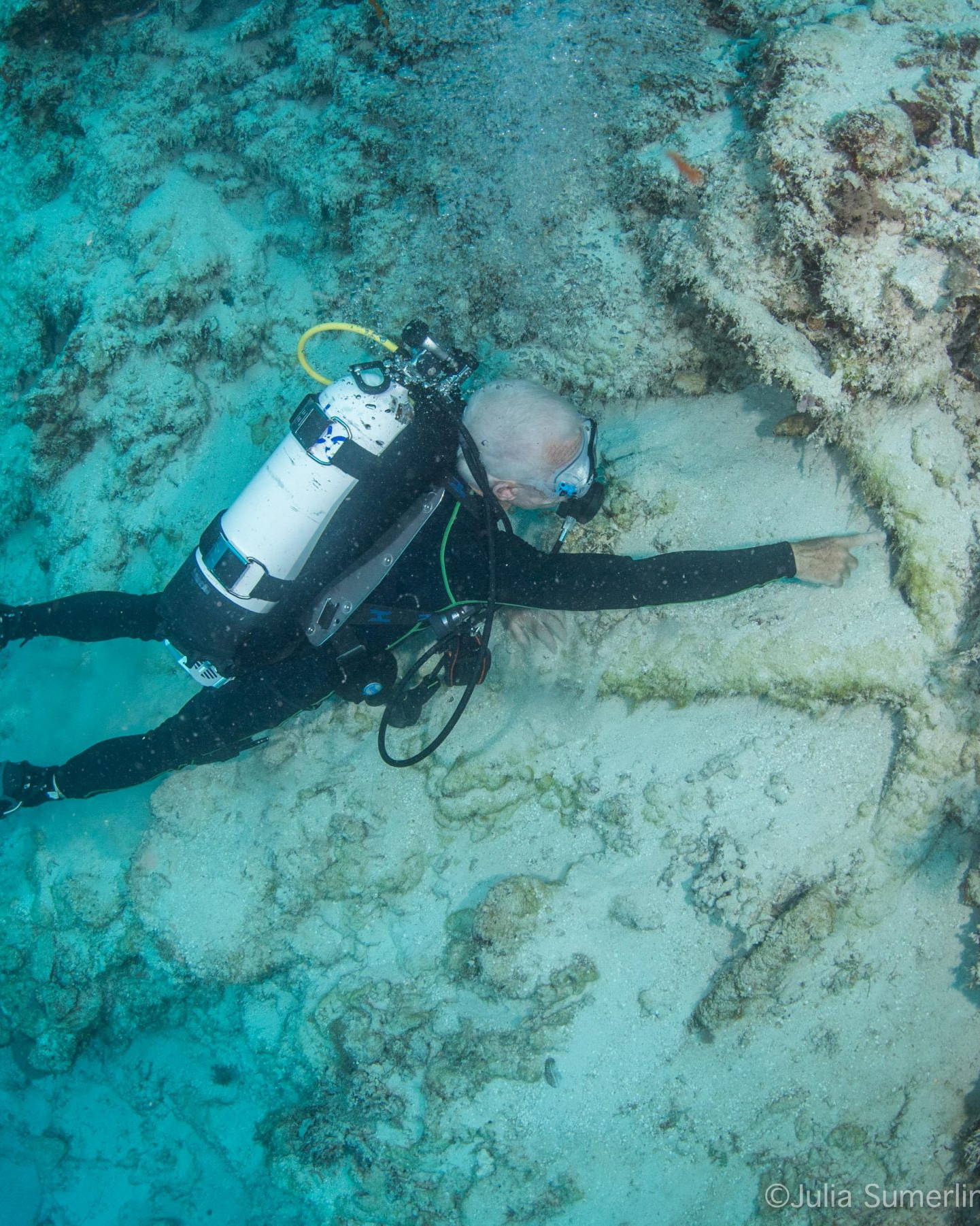 Kieran Hosty with an insitu anchor during the 2018 Boot Reef expedition. © Julia Sumerling/Silentworld Foundation.