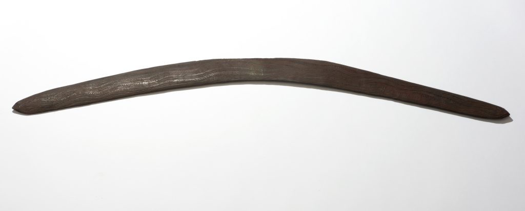 Carved Indigenous Australian hardwood boomerang
