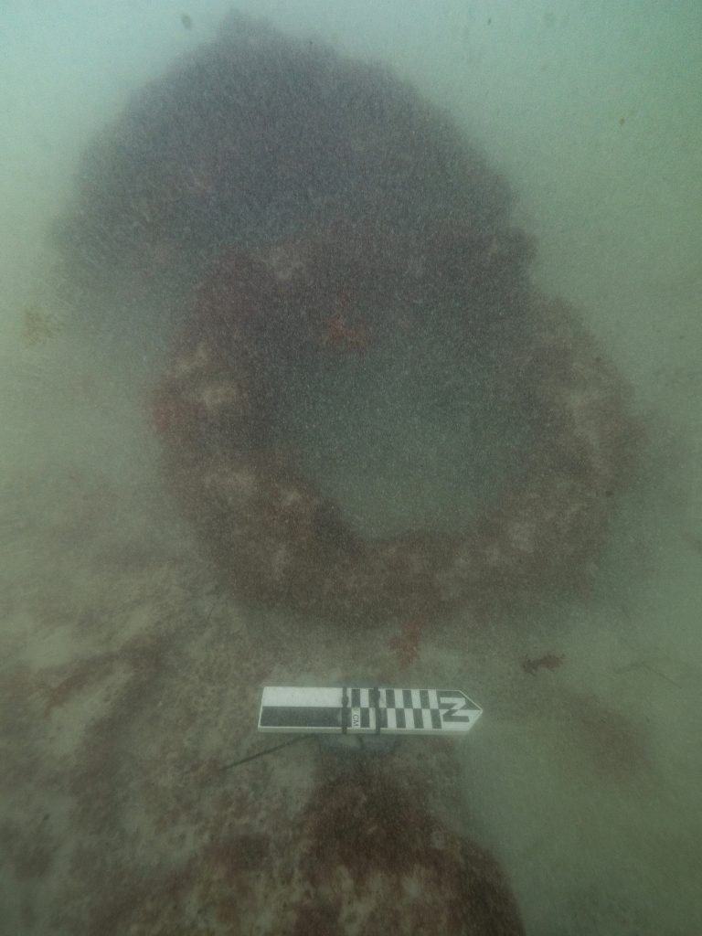Iron windlass components on the seabed in Guichen Bay